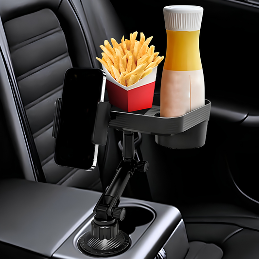 A black car center console cup holder mount with a suction cup base, shown holding a smartphone and a bottle of mustard and mayonnaise, with french fries in a red and white container, set inside a car interior.